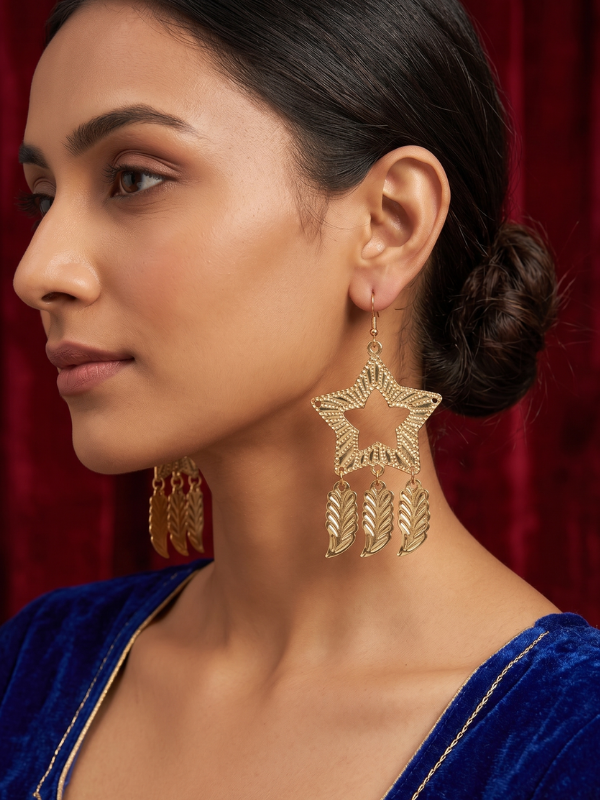 69 Celestial Gold-Tone Star Drop Earrings with Textured Leaf Charms - Image 1